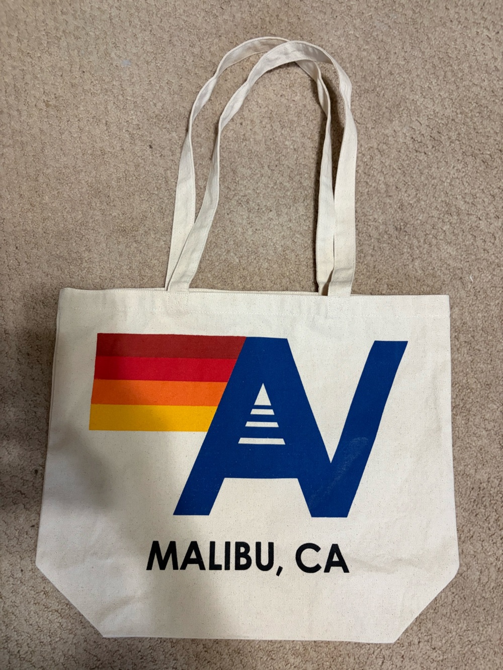 Aviator Nation Cream Canvas Tote with Blue Logo and Rainbow Stripes